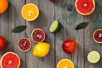 Citrus fruits on a wooden background