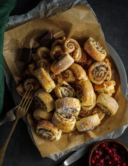 Delicious fresh homemade puff pastry with cinnamon and chocolate, rustic style