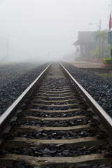 Fototapeta na wymiar Metal Railway Surround by Mist