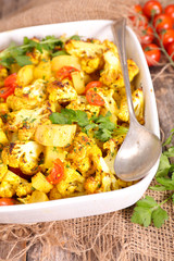 baked cauliflower with cream, curcuma and coriander