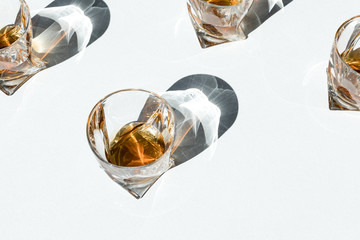 cognac in glasses with shadows