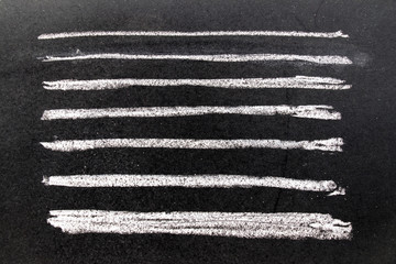 Fototapeta Set of grunge white chalk art brush in square line shape on black board background. Decoration and design element obraz