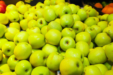 Apples on boxes in supermarket
