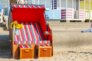 Traditional strandkorb beach chair on the Southwold Beach of the UK
