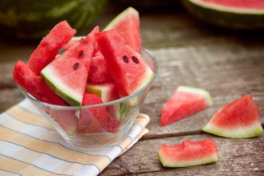 A bowl full of watermelon slices