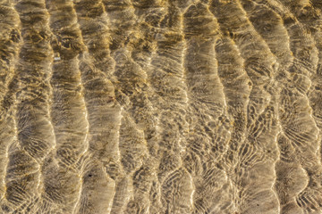 Beautiful sand formations have emerged at sea