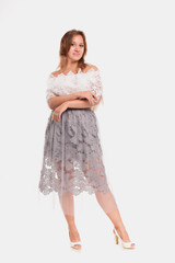 Cheerful female model on a white background