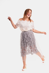 Naklejka premium Cheerful female model on a white background