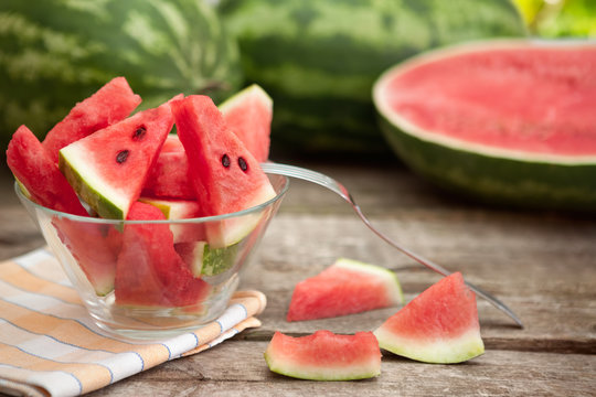 Served watermelon slices in glass bowl