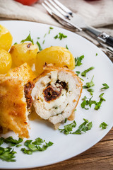 Chicken breast stuffed with cheese and dried tomatoes.