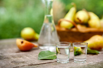 Pear alcohol drink in shot glass