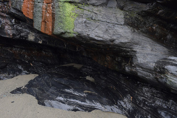Minerals in a slate cliff Tregardock Beach Cornwall