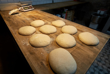 yeast bread dough on bakery kitchen table