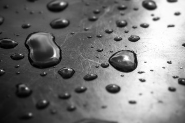 water drops on a metal plate