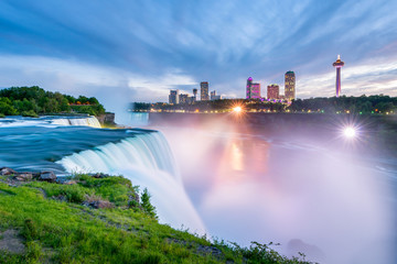 Niagara Falls around Sunset, captured in New York USA looking towards Ontario Canada - obrazy, fototapety, plakaty