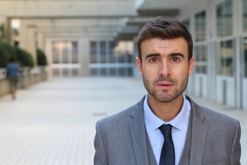 Fototapeta premium Perplexed businessman in office space 