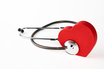 Medical stethoscope and red heart
