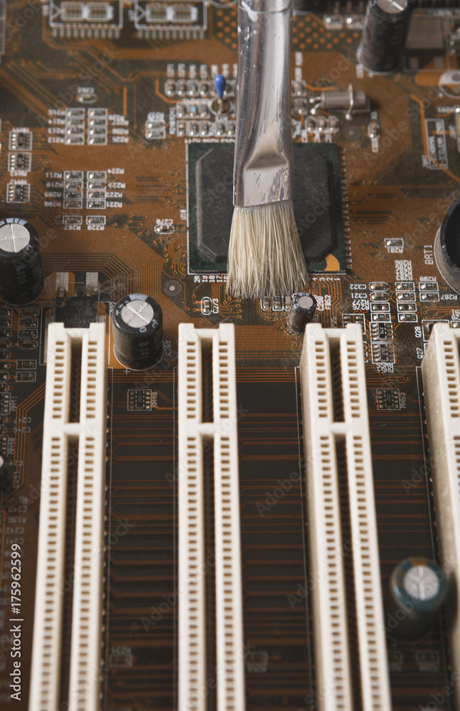 Poster Cleaning computer components close up