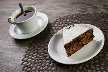 Slice of homemade cranberry cake with walnuts