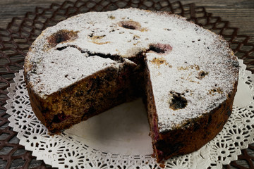 Homemade cranberry pie with walnuts, berries