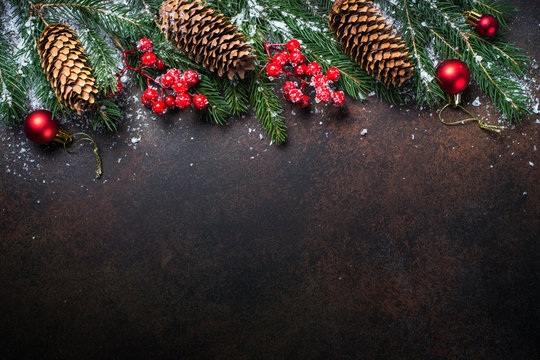 Christmas background with decor on dark rusty background. Top view..