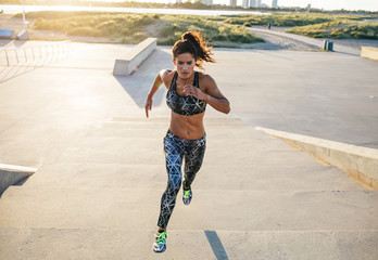 Woman doing a full intensity stair run