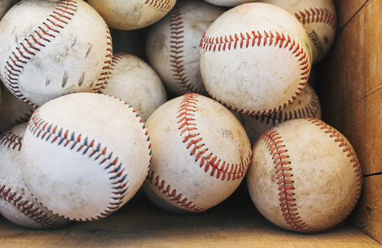 Box filled with baseballs