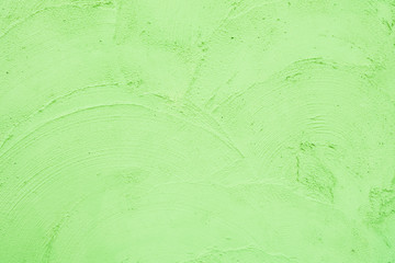Colorful of bright green color concrete wall texture background