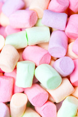 Colorful marshmallows as  background, macro. Fluffy marshmallows texture  or  pattern, close up.