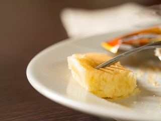 Fork stab on piece of pancake dessert. Diet and healthy concept.