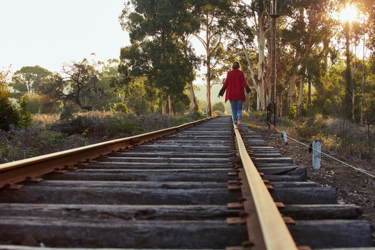 walking on train tracks