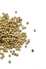 white pepper grains on the table
