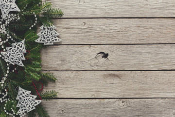 Fototapeta premium Christmas decoration, ornaments and garland frame background