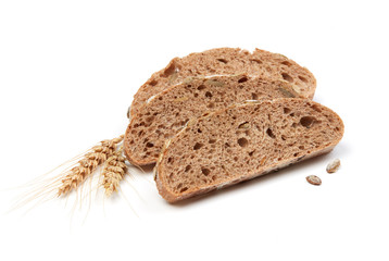 Bread slices and wheat