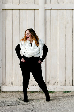 Beautiful woman wearing oversized scarf
