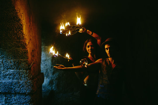Couple of young fire performers