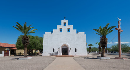 Fototapeta na wymiar Exterior of the St John the Evangelist Catholic Church on Ajo Way in Tucson, Arizona