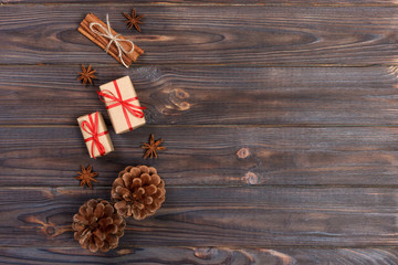 Natural Christmas Accessories Pine Cones Wooden Star Decorated Linen Cord Cinnamon Vintage Gifts on Wooden Background
