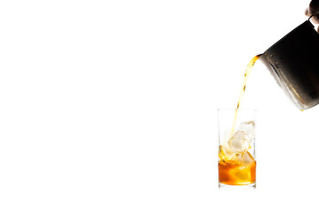 Coffee clod brew process (Method) by French press. Fill-pouring iced americano into a glass of water with iced. with free text copy space. Isolated on white background with clipping path.