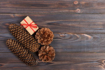 Natural Christmas Accessories Pine Cones Wooden Star Decorated Linen Cord Cinnamon Vintage Gifts on Wooden Background