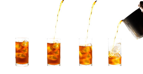 Coffee clod brew process (Method) by French press. Fill-pouring iced americano into a glass of water with iced.  Isolated on white background with clipping path.