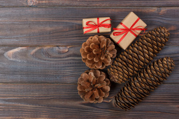 Natural Christmas Accessories Pine Cones Wooden Star Decorated Linen Cord Cinnamon Vintage Gifts on Wooden Background
