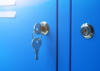 Blue metal Locker cabinet and key chain