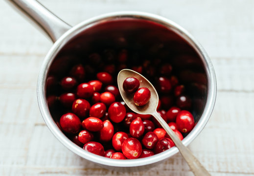 Fresh Ripe Cranberries in a Saucepan ready to be heated