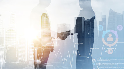 business people shaking hands over city background