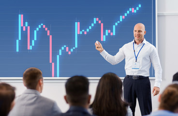 group of people at business conference or lecture