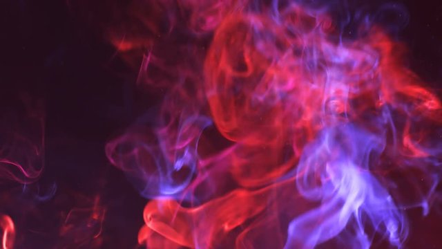 Mulicolor smoke and sparks flying. Seamless loop 4k UHD (3840x2160)
