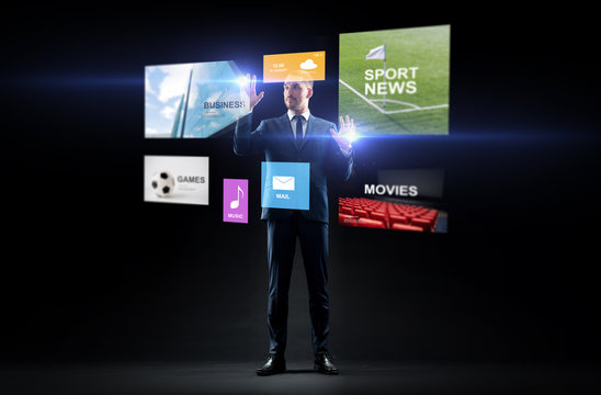 businessman with applications on virtual screen