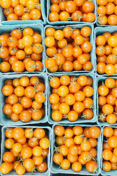 Fresh whole orange cherry tomatoes