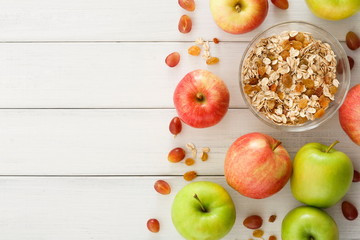 Healthy morning meals with muesli and apples